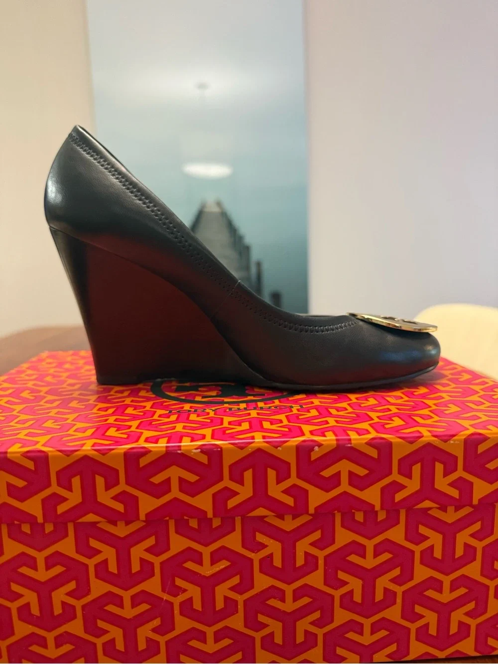 Tory Burch Black Leather Pumps with Gold Logo Medallion